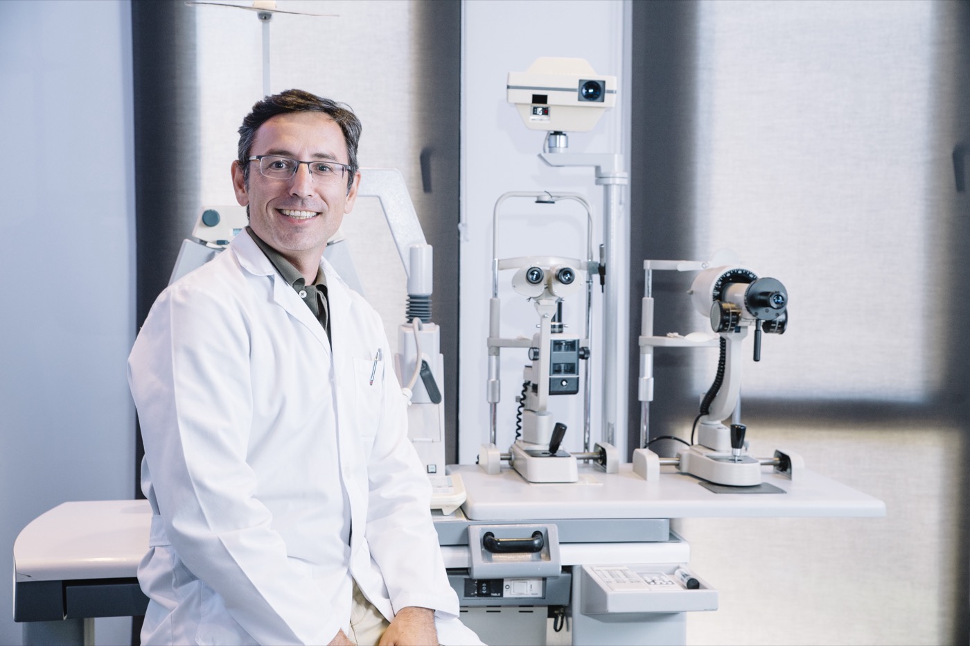 Smiling optometrist in a doctor's office